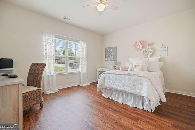 bedroom with hardwood / wood-style flooring and ceiling fan