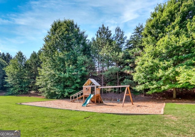 view of jungle gym with a yard