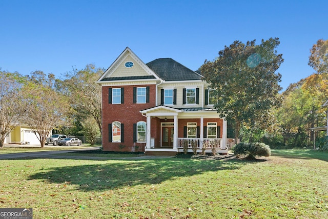 view of front of home featuring a porch and a front yard