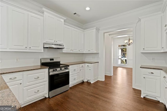 kitchen with dark hardwood / wood-style flooring, stainless steel range, white cabinets, and an inviting chandelier