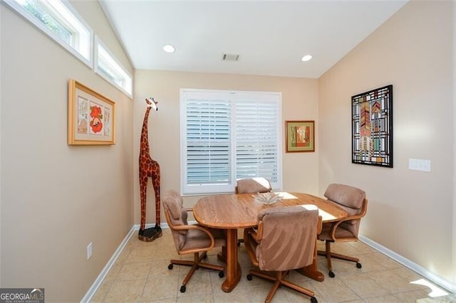 dining area featuring light tile patterned floors