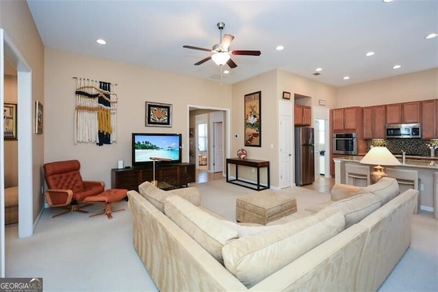 living room with ceiling fan