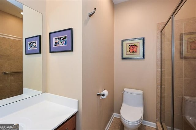 bathroom featuring tile patterned floors, vanity, toilet, and an enclosed shower