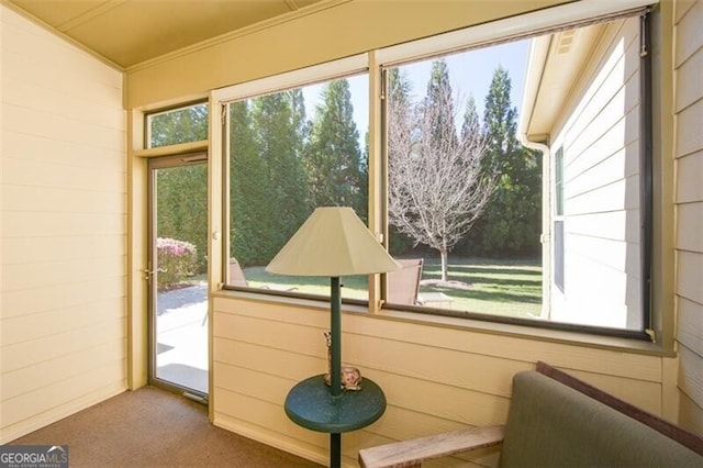 sunroom / solarium featuring a wealth of natural light