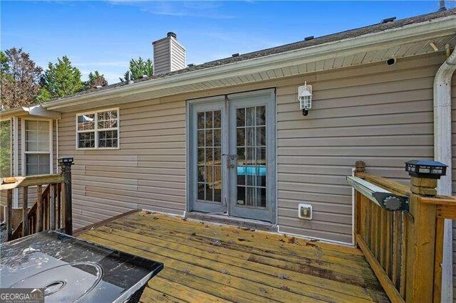 wooden deck with french doors