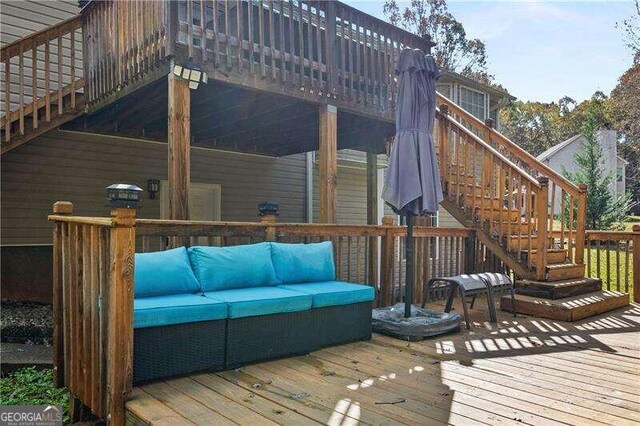 deck with an outdoor hangout area