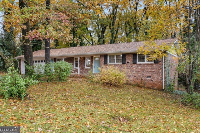 single story home with a front yard