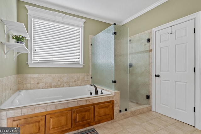 bathroom featuring tile patterned floors, crown molding, and independent shower and bath