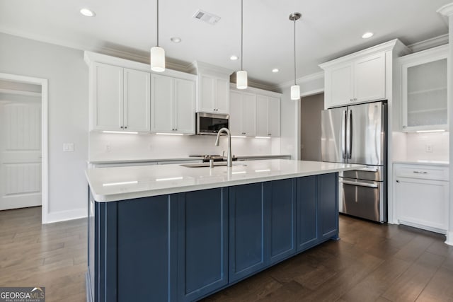 kitchen with white cabinetry, hanging light fixtures, tasteful backsplash, dark hardwood / wood-style flooring, and appliances with stainless steel finishes