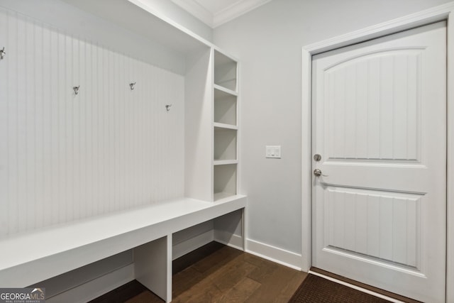 mudroom with dark hardwood / wood-style floors and ornamental molding