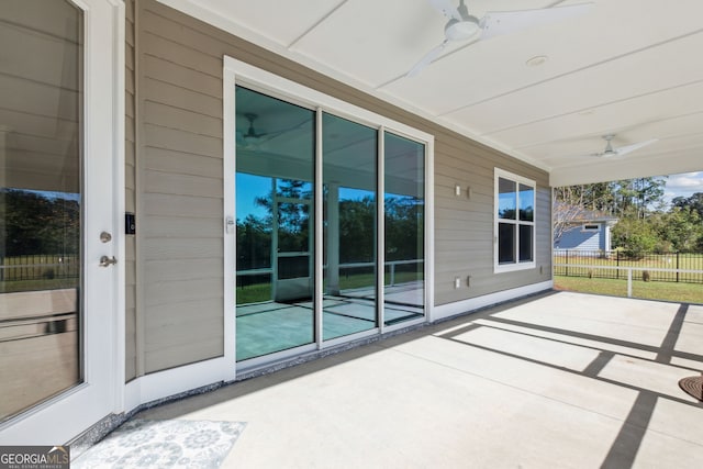 view of patio / terrace featuring ceiling fan