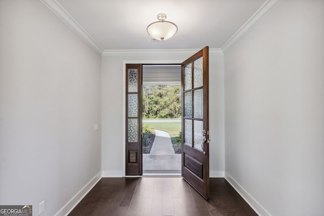 foyer entrance with crown molding, dark wood-type flooring, and french doors