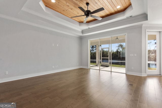 unfurnished room featuring ornamental molding, a tray ceiling, ceiling fan, hardwood / wood-style flooring, and wooden ceiling