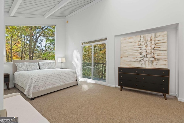 bedroom featuring vaulted ceiling with beams, light colored carpet, and wooden ceiling