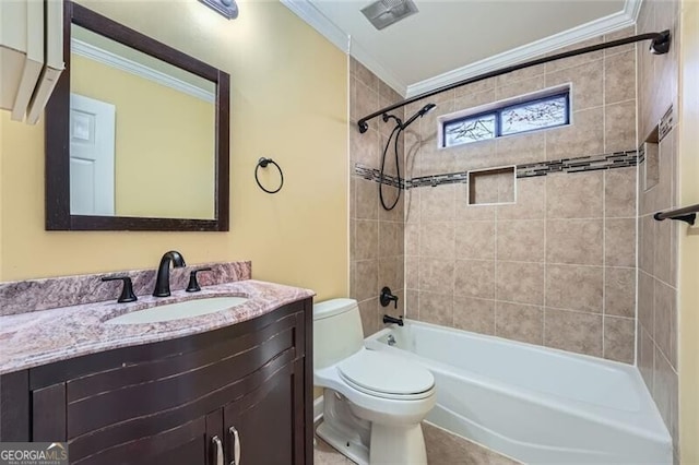 full bathroom with tiled shower / bath combo, toilet, crown molding, and vanity