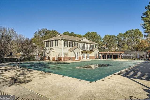 view of pool featuring a patio