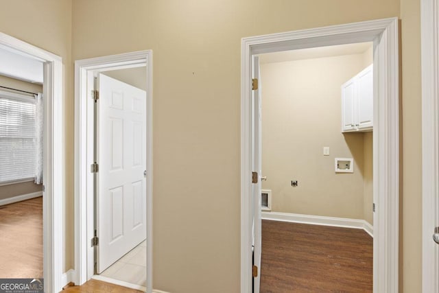 727 Pear Grove Pl, Marietta, GA 30066 - laundry room with cabinet space, hookup for a washing machine, baseboards, and wood finished floors