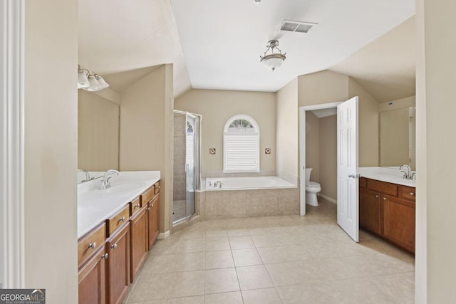 727 Pear Grove Pl, Marietta, GA 30066 - bathroom with two vanities, a stall shower, a garden tub, lofted ceiling, and tile patterned flooring