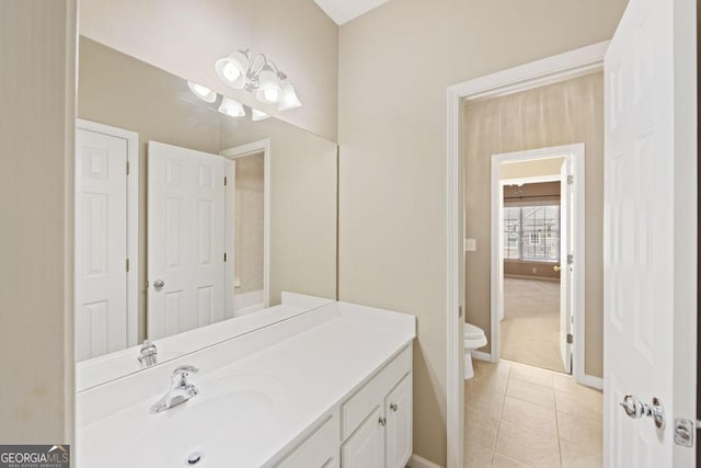 727 Pear Grove Pl, Marietta, GA 30066 - bathroom featuring toilet, vanity, tile patterned floors, and baseboards
