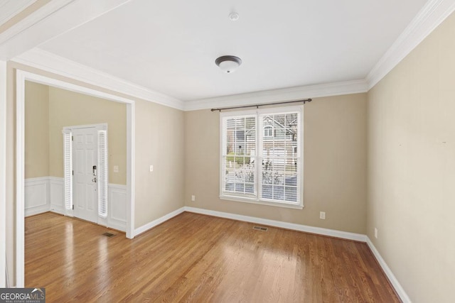 727 Pear Grove Pl, Marietta, GA 30066 - spare room featuring wood finished floors and ornamental molding