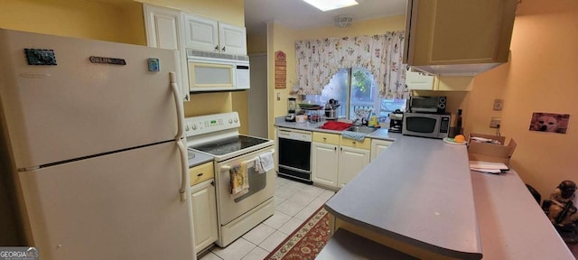 kitchen with white appliances and light tile patterned floors