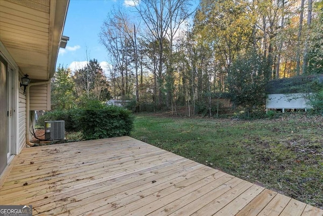 deck with central air condition unit and a yard