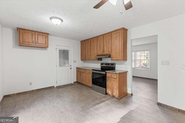 kitchen with ceiling fan, tasteful backsplash, a textured ceiling, stainless steel electric stove, and light wood-type flooring