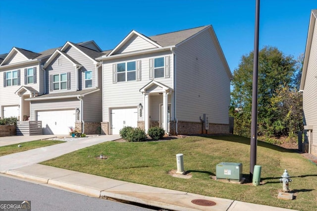 view of front of house featuring a garage and a front lawn