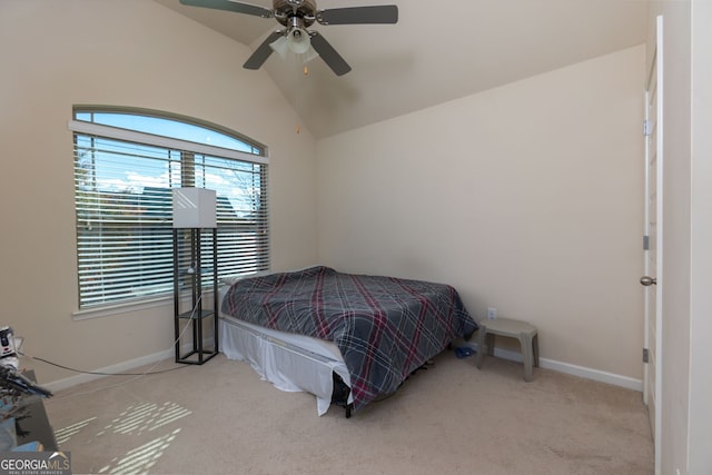 carpeted bedroom featuring ceiling fan and lofted ceiling