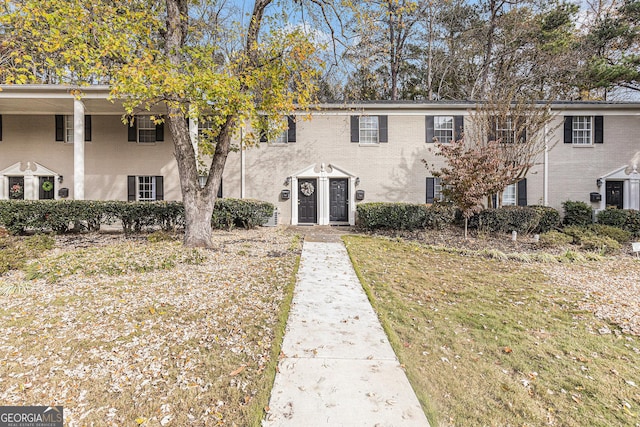 view of front of house featuring central AC unit