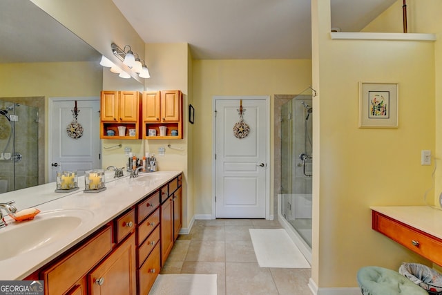 bathroom featuring tile patterned flooring, vanity, and walk in shower