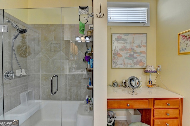 bathroom featuring a shower with door