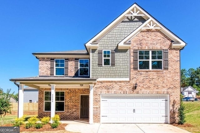 craftsman-style house featuring a garage