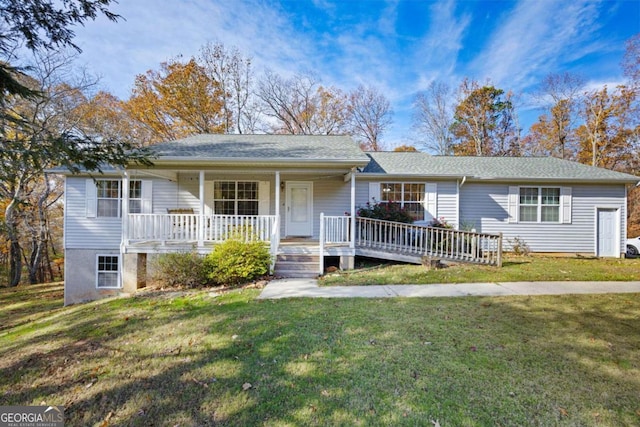 single story home featuring covered porch and a front lawn