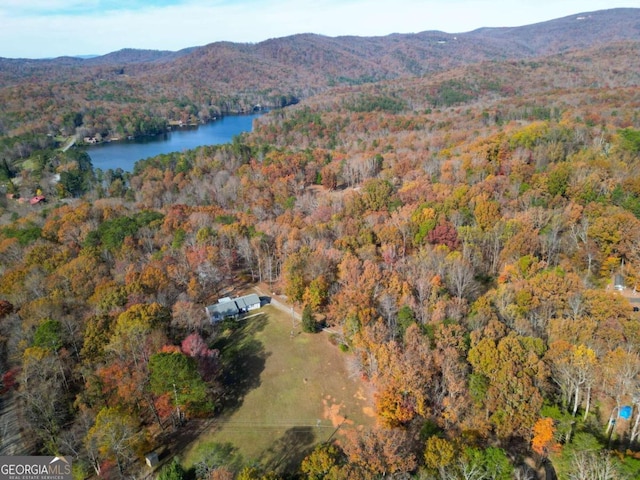 bird's eye view with a water and mountain view