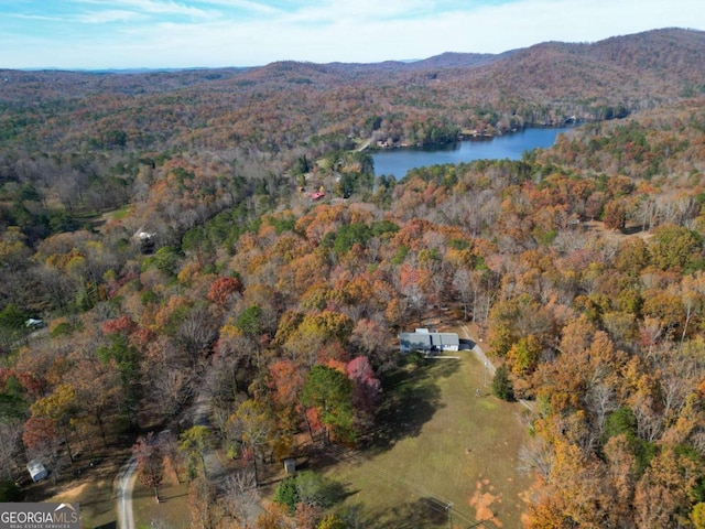 bird's eye view with a water and mountain view