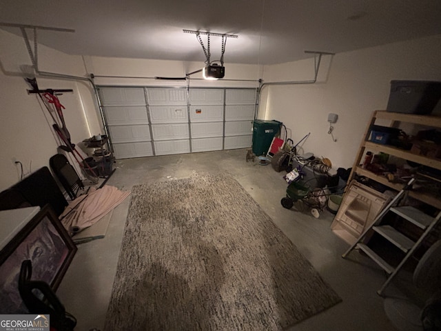 garage featuring a garage door opener