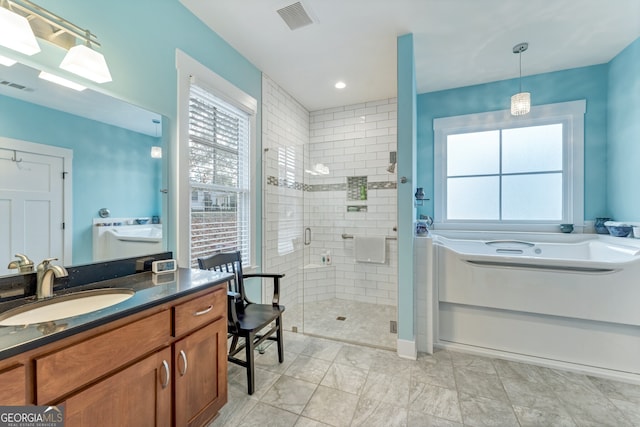 bathroom with vanity and plus walk in shower