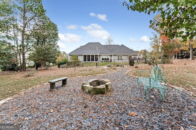 view of yard with an outdoor fire pit