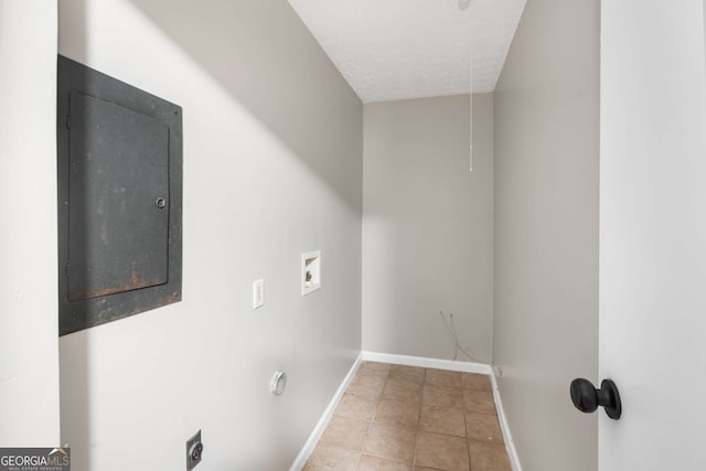 washroom with tile patterned floors, electric dryer hookup, hookup for a washing machine, and electric panel