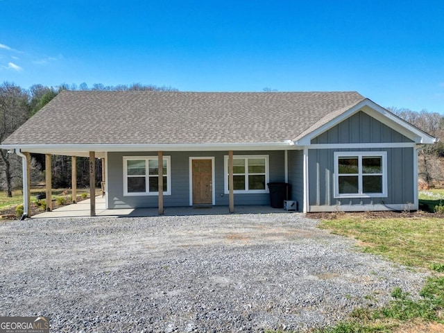 ranch-style home featuring a porch