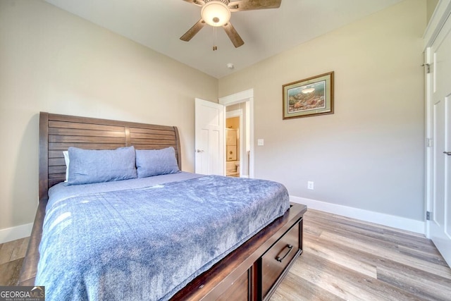 bedroom with ceiling fan and light wood-type flooring