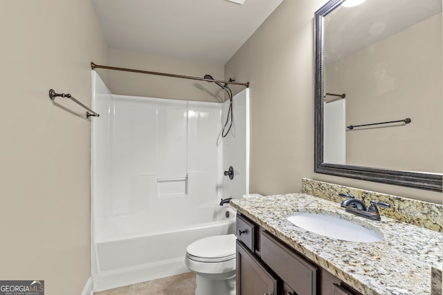 full bathroom with tile patterned flooring, shower / tub combination, vanity, and toilet