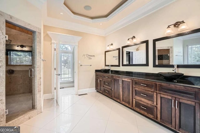 bathroom with tile patterned floors, walk in shower, and a wealth of natural light