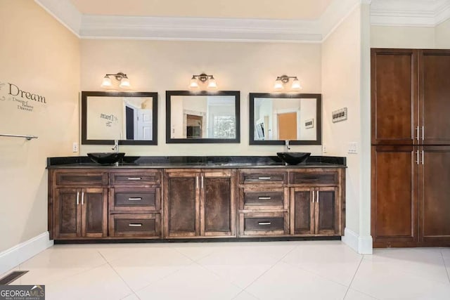 bathroom featuring vanity, tile patterned floors, and crown molding