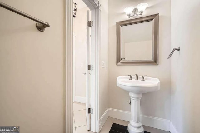 bathroom with tile patterned flooring