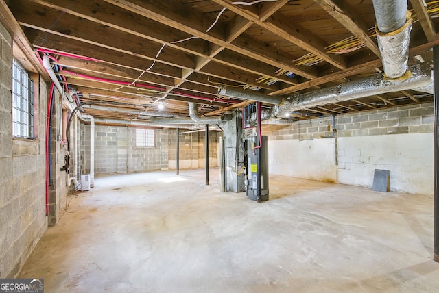 basement featuring gas water heater