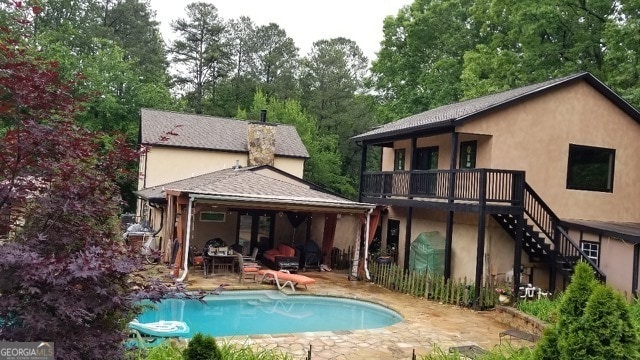 rear view of house featuring a patio area