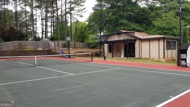 view of tennis court with basketball court