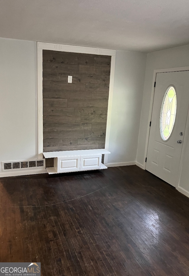 entryway featuring dark wood-type flooring